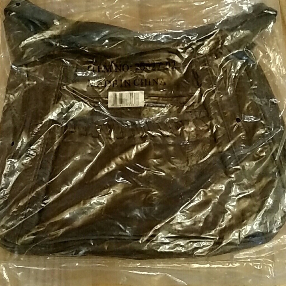 NWT black purse still sealed in bag!